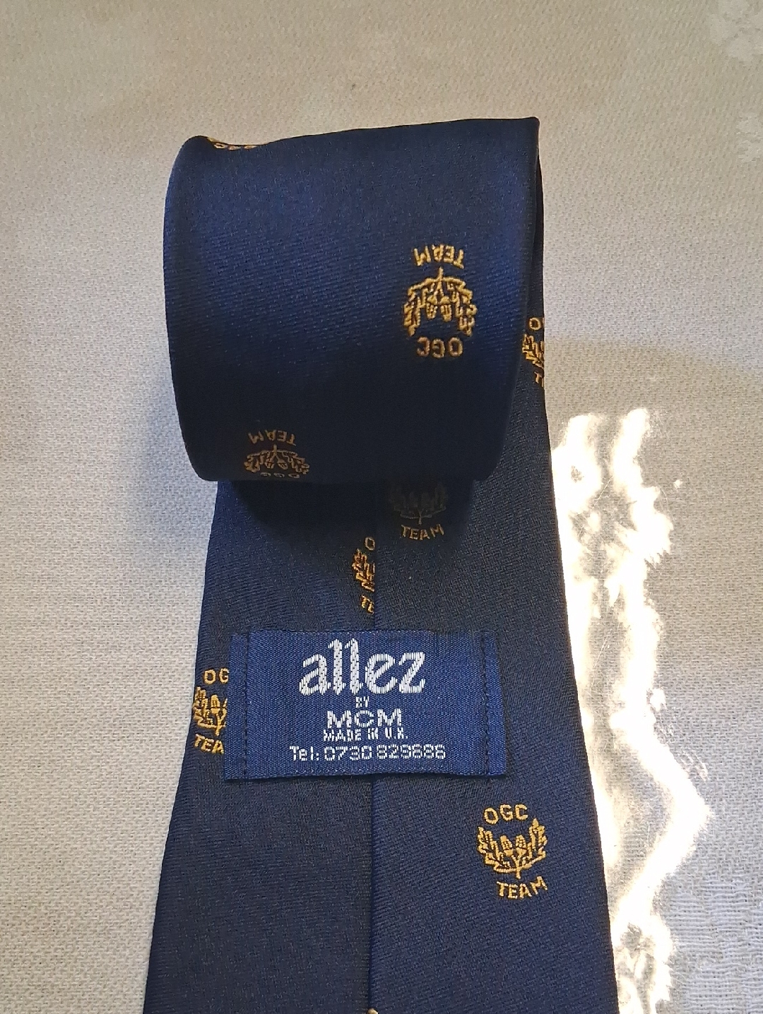 Navy Blue Mens Tie With Gold Crest